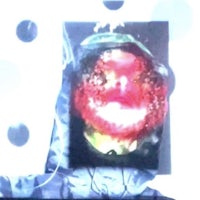 an image of a face with polka dots on it